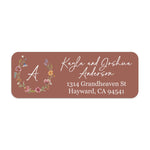 XOXOKristen close-up of floral wreath address label featuring hand-drawn blossoms, greenery, and monogram letter with modern script - XOXOKristen