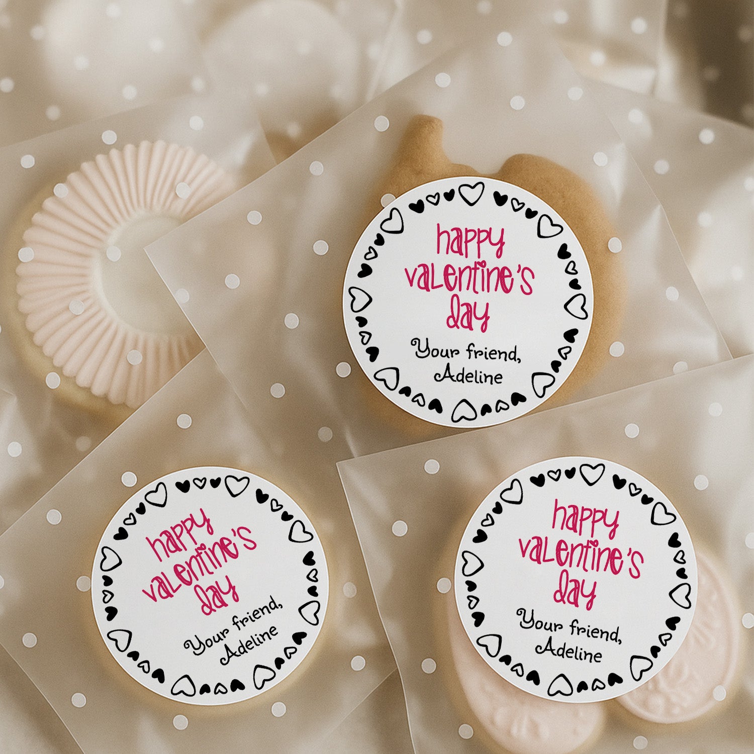 XOXOKristen custom Valentine favor stickers on clear polka dot cookie bags, white background with black heart border and pink lettering – XOXOKristen