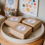 XOXOKristen Valentine’s stickers sealing kraft favor boxes, round labels with playful heart border and bright lettering for classroom gifts – XOXOKristen