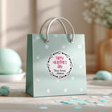 XOXOKristen custom Valentine sticker on pastel mint gift bag with polka dots, round design with heart border for kids’ classroom favors – XOXOKristen