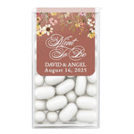 Elegant wedding sticker design with brown background, cascading florals, and romantic script, tailored for personalized Tic Tac wedding favors.