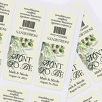XOXOKristen sheet of personalized ivory and greenery wedding stickers, elegant labels tailored for Tic Tac mint wedding favors.