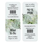 XOXOKristen single custom Tic Tac wedding label in white with delicate green leaves and modern typography, designed for personalized favors.