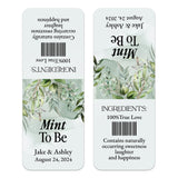 XOXOKristen single custom Tic Tac wedding label in white with delicate green leaves and modern typography, designed for personalized favors.