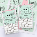 Personalized Mint To Be wedding favor label in mint green with black floral line art design, applied on Tic Tac box with white mints.