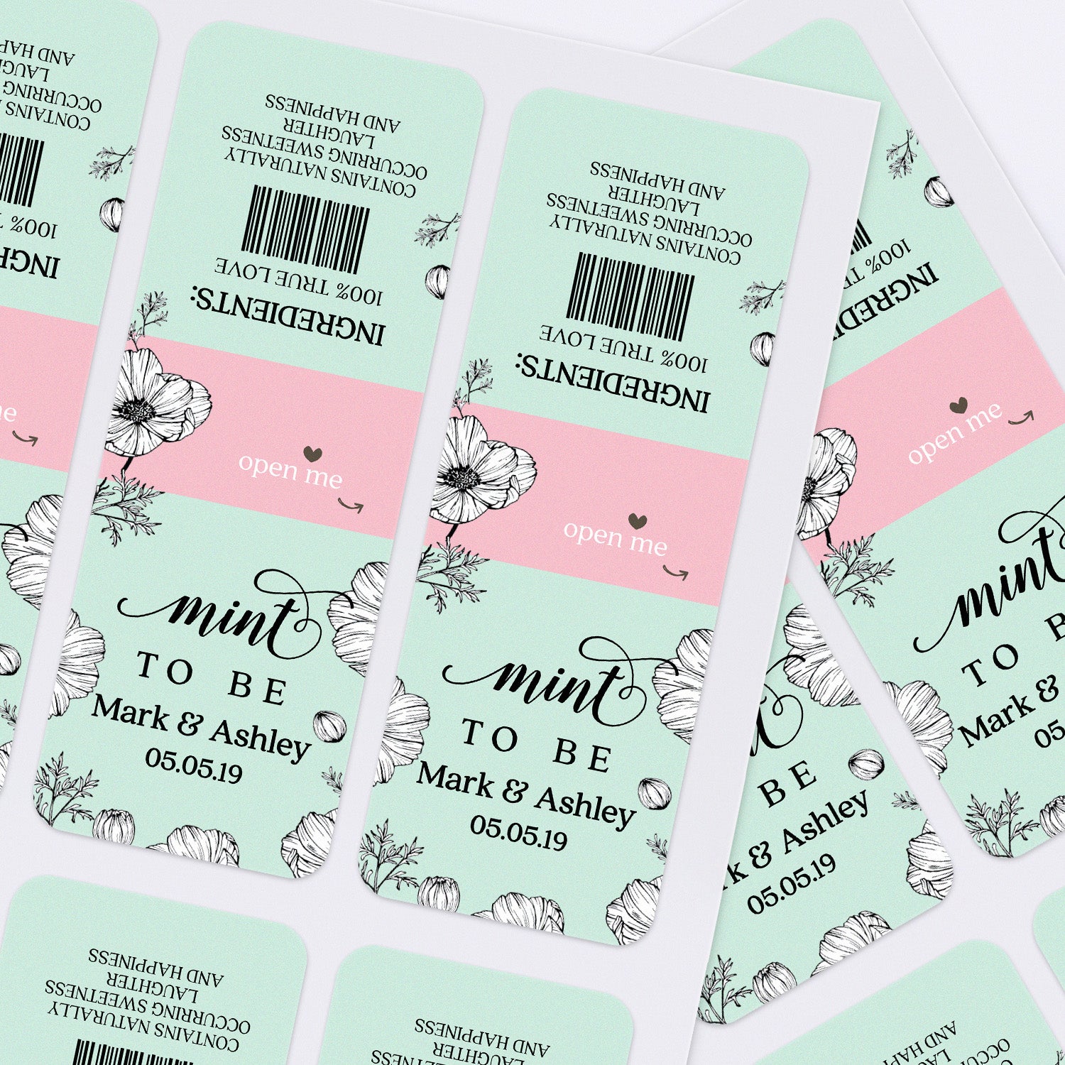 Sheet of Mint To Be personalized wedding labels in mint green and pink with botanical black floral artwork for DIY Tic Tac favors.