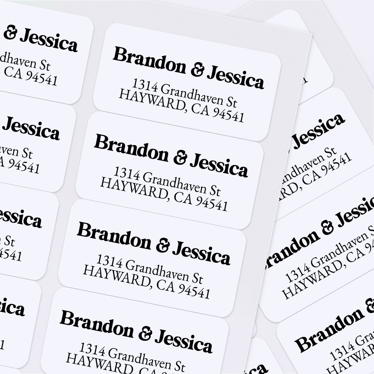 XOXOKristen bulk sheet of personalized address labels in black text on white with rounded corners, ready for envelope sealing – XOXOKristen