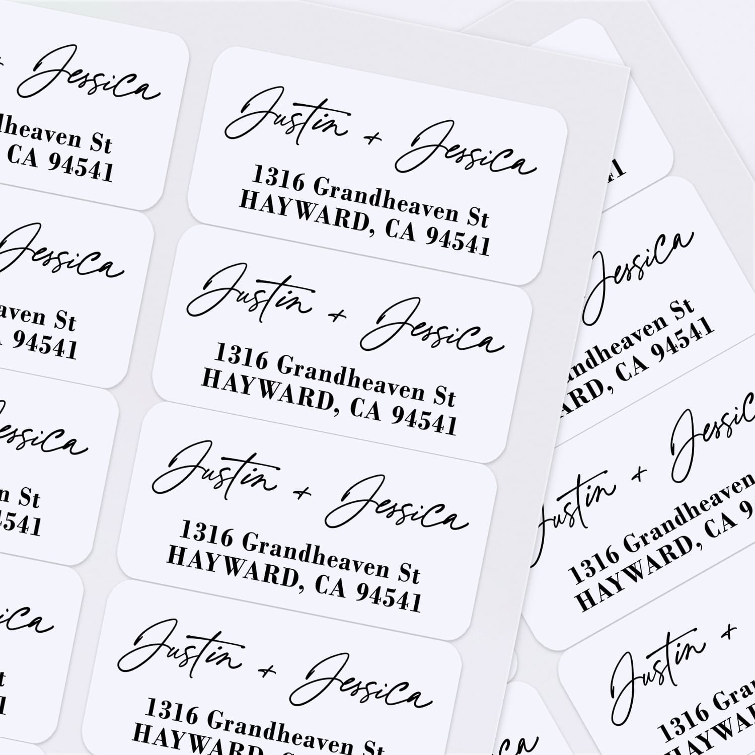 XOXOKristen custom address labels in elegant black handwritten script paired with serif font, applied to burgundy and blush envelopes – XOXOKristen