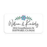 XOXOKristen close-up of return address label with bright teal flower, leafy sprigs, and bold black lettering on white background - XOXOKristen