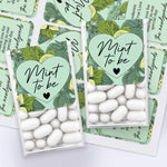 XOXOKristen personalized “Mint to Be” labels in botanical theme with greenery background, shown on printed sheets and favor boxes – XOXOKristen