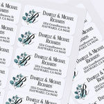 Custom address label stickers displayed on pink and burgundy envelopes, featuring monogram with green eucalyptus design and serif typography - XOXOKristen