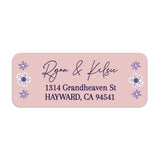 Close-up of pink floral return address label with whimsical purple flower illustrations and stylish handwritten typography - XOXOKristen