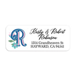 Personalized return address label with bold blue and pink custom monogram and teal floral accents on white background - XOXOKristen