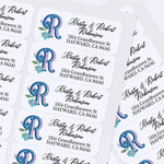 Custom floral monogram address label with decorative custom initial, leaves, and pink flower on white adhesive paper - XOXOKristen