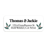 Sheet of personalized holiday return address stickers with holly and berry designs, perfect for Christmas cards and seasonal correspondence - XOXOKristen
