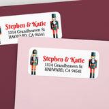 Custom nutcracker return address labels on pink and burgundy envelopes, featuring Christmas soldier design and elegant printed text - XOXOKristen