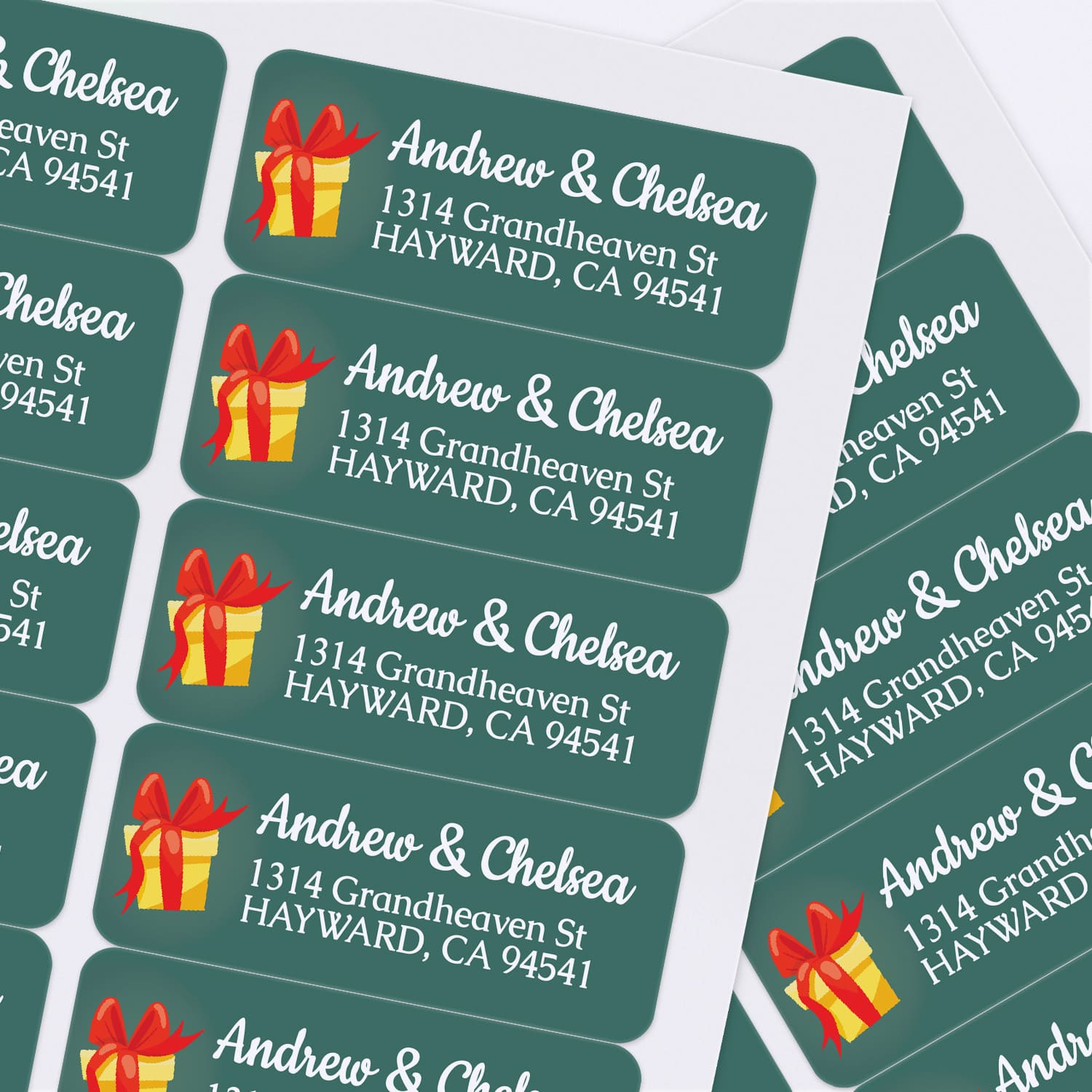 XOXOKristen holiday-themed return address sticker sheet with green background and festive present illustration.
