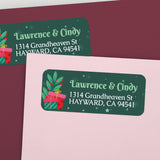 Personalized holiday address labels on pink and burgundy envelopes with festive gift box illustrations and green background – XOXOKristen
