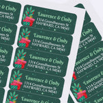 Custom Christmas label design with red and green gift boxes, star accents, and personalized white text on dark green background – XOXOKristen