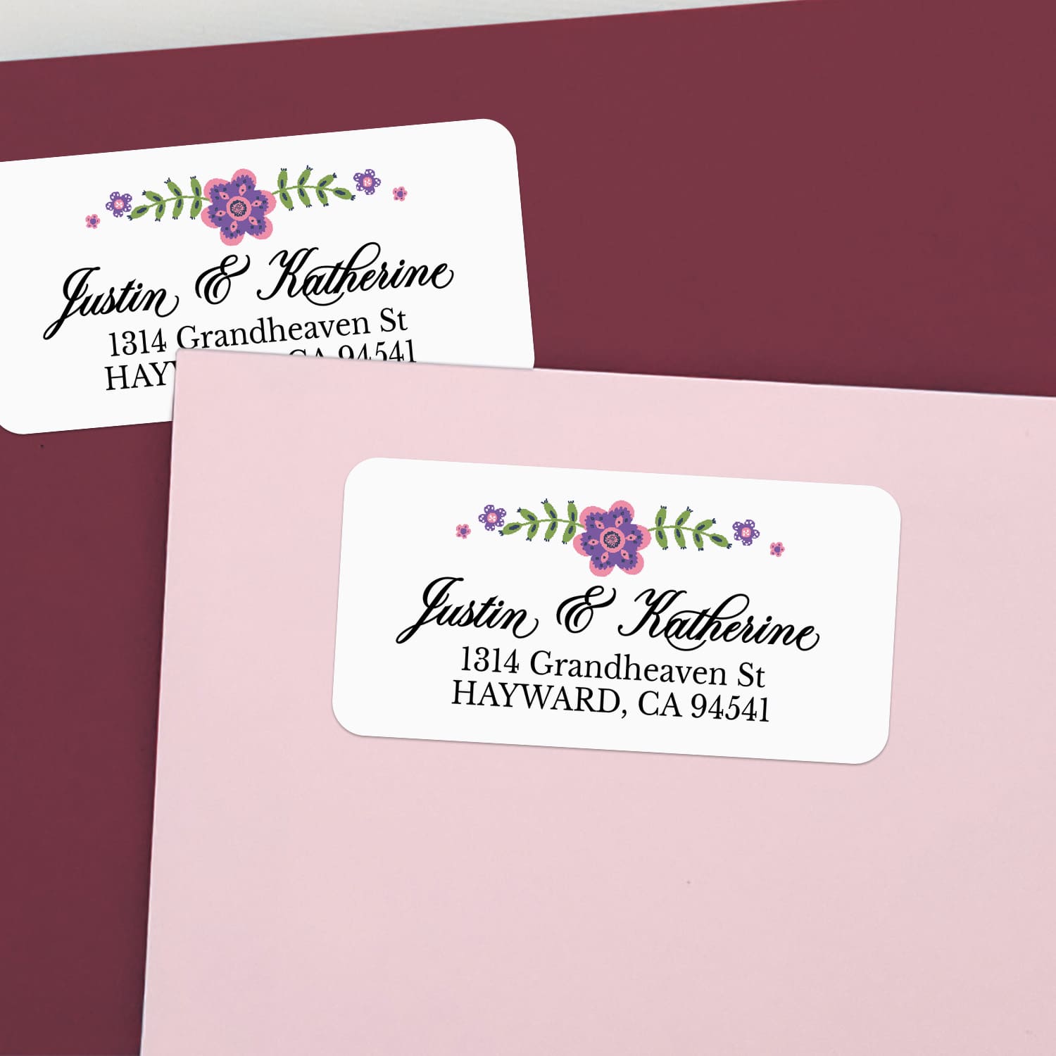 Sheet of personalized return address labels with floral design in pink, purple, and green, ready to peel and stick - XOXOKristen