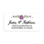 Personalized return address label with pink and purple floral design on a white background, shown on an envelope - XOXOKristen
