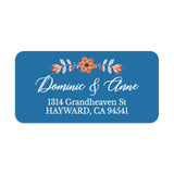 Personalized floral return address label with orange blossom and leaves on bold blue background, custom white script lettering on envelope - XOXOKristen