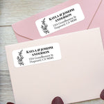 XOXOKristen custom floral line art address labels on pastel pink envelopes, featuring monochrome flower design with clean fonts - XOXOKristen