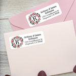 XOXOKristen custom floral wreath address labels on pastel pink envelopes, featuring soft watercolor-style roses and elegant serif text - XOXOKristen