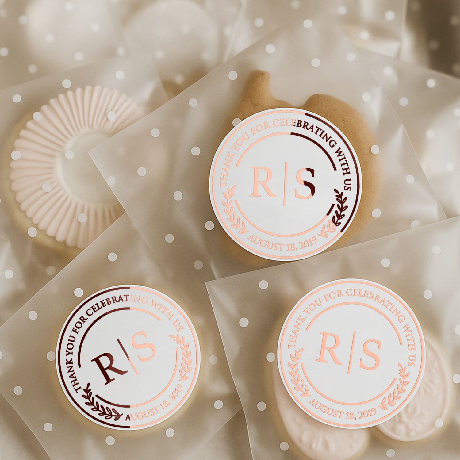 XOXOKristen personalized clear wedding stickers with rose gold foil, round shape, perfect for sealing cookie favor bags at elegant wedding receptions.