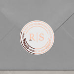 XOXOKristen foiled wedding sticker on envelope, round clear label with rose gold metallic text, ideal for sealing invitations and thank you notes.
