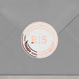 XOXOKristen foiled wedding sticker on envelope, round clear label with rose gold metallic text, ideal for sealing invitations and thank you notes.