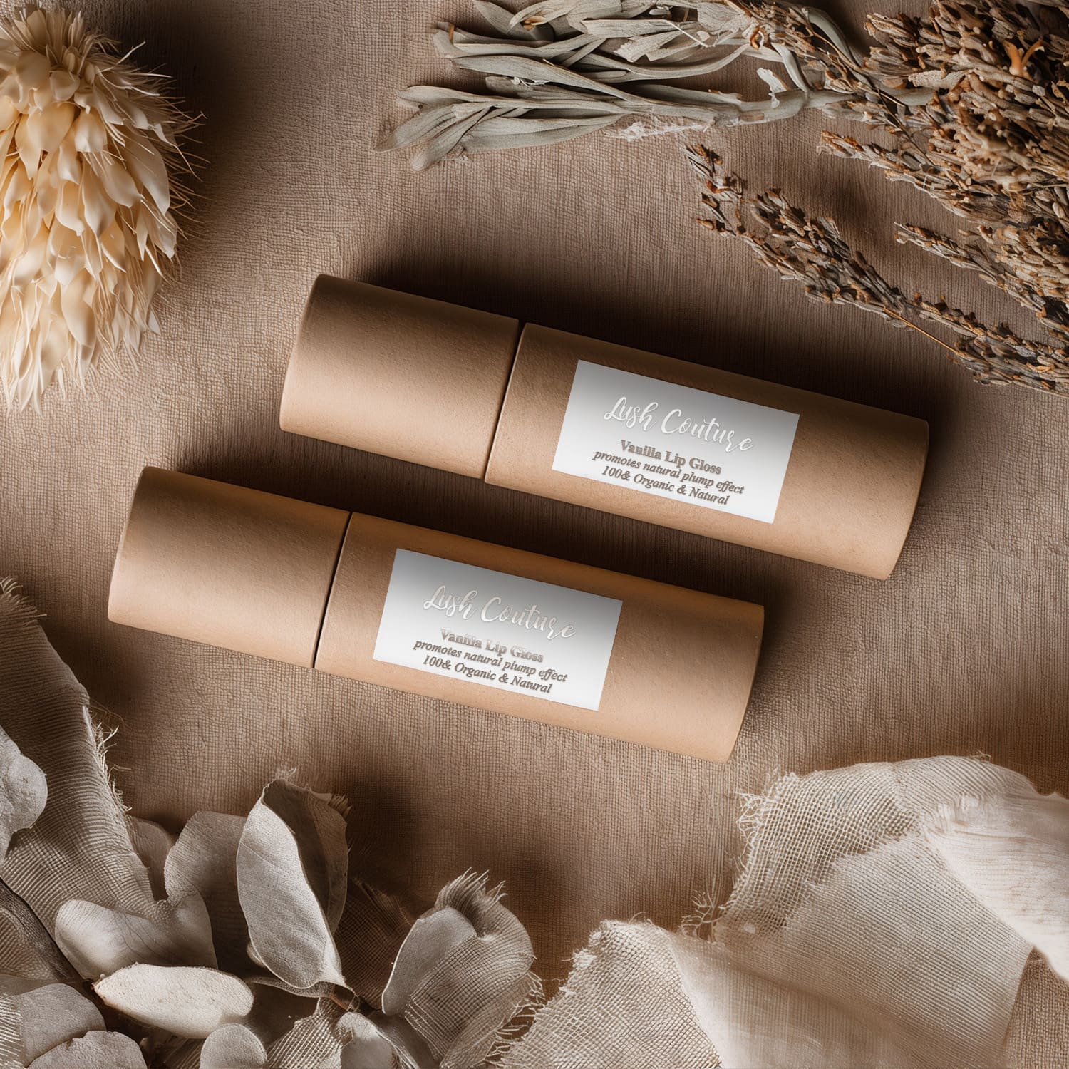 Kraft tubes wrapped with silver foil rectangular branding stickers, featuring script and serif typography in luxury minimalist style – XOXOKristen.