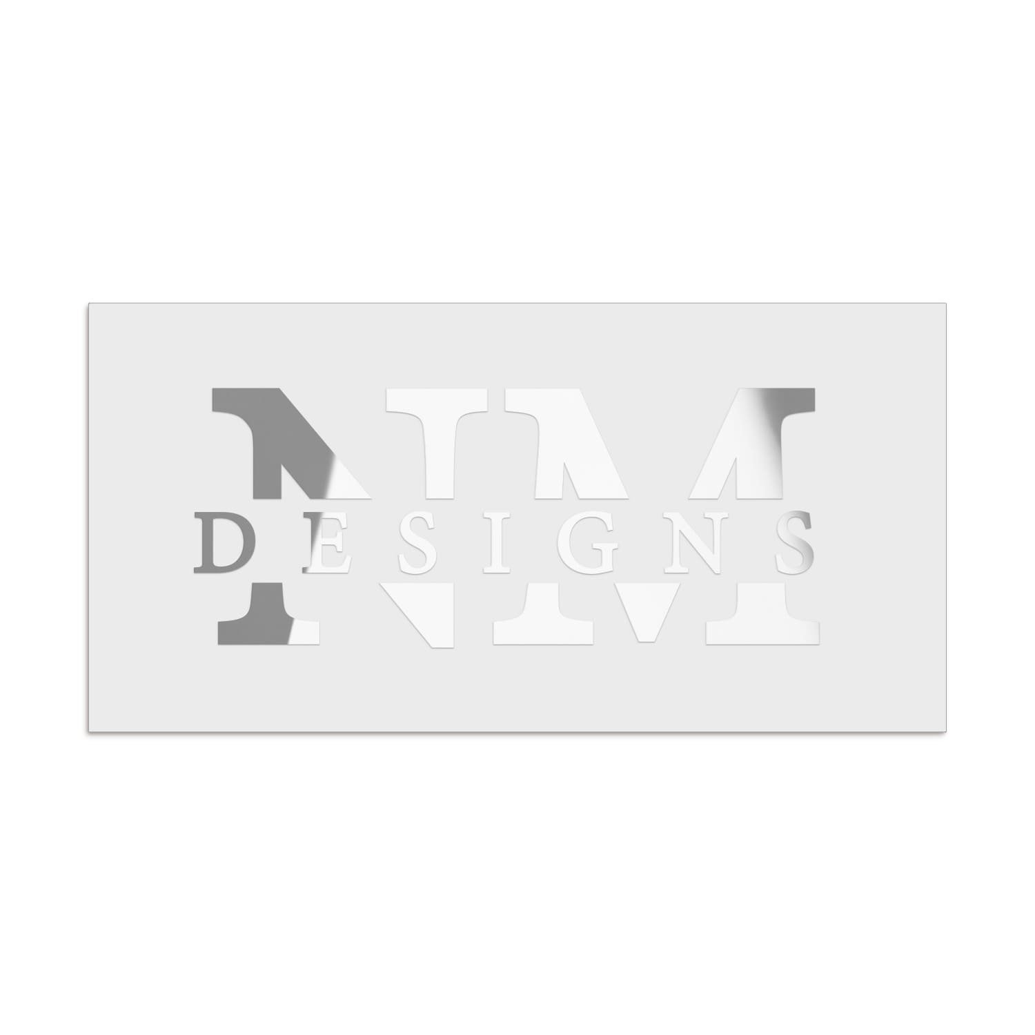 Silver foil rectangular branding label with oversized serif typography and contrasting thin serif detail, glossy metallic finish – XOXOKristen.