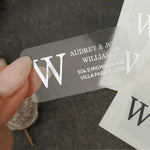 XOXOKristen custom return address label with large serif initial and names, printed in white on clear PVC vinyl, elegant envelope seal sticker - XOXOKristen