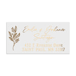 Personalized wedding return address labels with floral branch motif, printed in rose gold foil and black ink, shown on pink envelopes - XOXOKristen