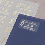 XOXOKristen gold foil personalized return address label stickers with foliage design, applied on navy blue envelope, luxury custom label sheet - XOXOKristen