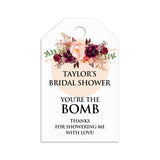 XOXOKristen personalized Burgundy Floral Bridal Shower Tags attached to a linen pouch with jute twine, showcasing deep wine flowers and the “You’re the Bomb” thank-you message.