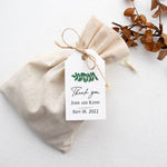 XOXOKristen Green Leaf Thank You Tags placed on a white floral background, highlighting the minimalist greenery illustration and static “Thank you” text in refined black typography.