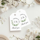 XOXOKristen Greenery Thank You Tags featuring a delicate watercolor wreath of eucalyptus and soft greenery surrounding printed initials and the static text “Thank you.” Perfect for personalized wedding favors and nature-inspired packaging.