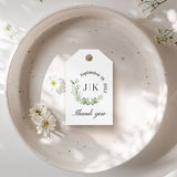 XOXOKristen Eucalyptus Thank You Tags tied with natural twine onto a linen favor bag, showing the delicate printed “Thank you” text below the greenery wreath for a rustic botanical presentation.