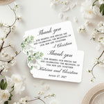 XOXOKristen Greenery Wedding Thank You Tag placed on soft beige fabric — minimalist botanical design, personalized and custom tag for weddings.