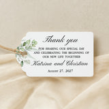 XOXOKristen Greenery Wedding Thank You Tag placed on soft beige fabric — minimalist botanical design, personalized and custom tag for weddings.