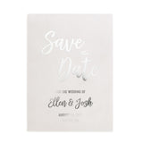 XOXOKristen minimalist Save the Date card with reflective silver foil print on smooth vellum, combining script and serif fonts for luxurious wedding style – XOXOKristen.