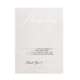 Translucent vellum wedding invitation showcasing silver foil details and refined calligraphy typography. The minimalist design highlights metallic shimmer and smooth vellum finish, suitable for luxury events. - XOXOKristen