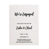 A minimalist vellum engagement Save the Date card shown flat on a white background. The text reads “We’re Engaged – Please save the date for” with space for names and a wedding website line below. Printed in sleek black ink for a timeless monochrome look - XOXOKristen