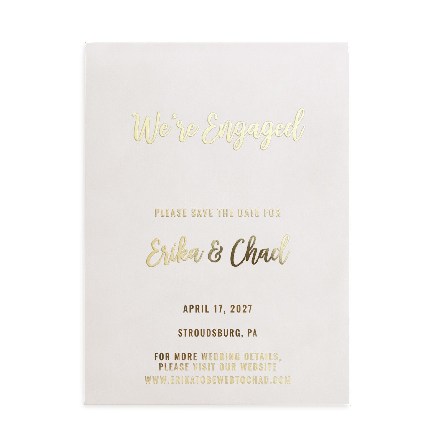 A gold foiled vellum card displayed on a clean, neutral surface. The warm metallic shine of the gold text stands out against the translucent background, creating a sense of luxury and modern celebration - XOXOKristen