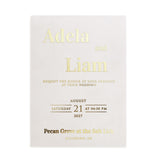 A minimalist vellum wedding invitation with elegant typography and structured text alignment. Printed in gold foil on semi-transparent vellum, paired with a matching envelope for a polished and classic wedding presentation – XOXOKristen.