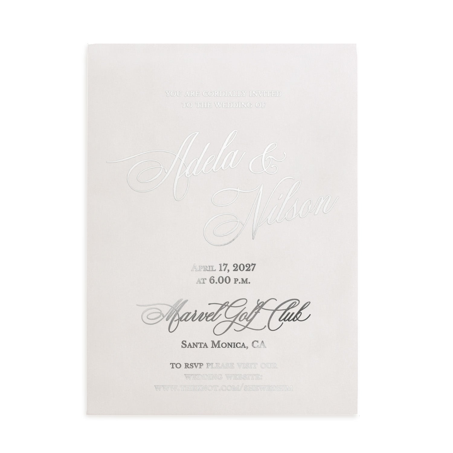 Elegant silver-foil vellum invitation displayed under natural light with floral stems and soft shadows, perfect for luxury wedding stationery mockups – XOXOKristen.