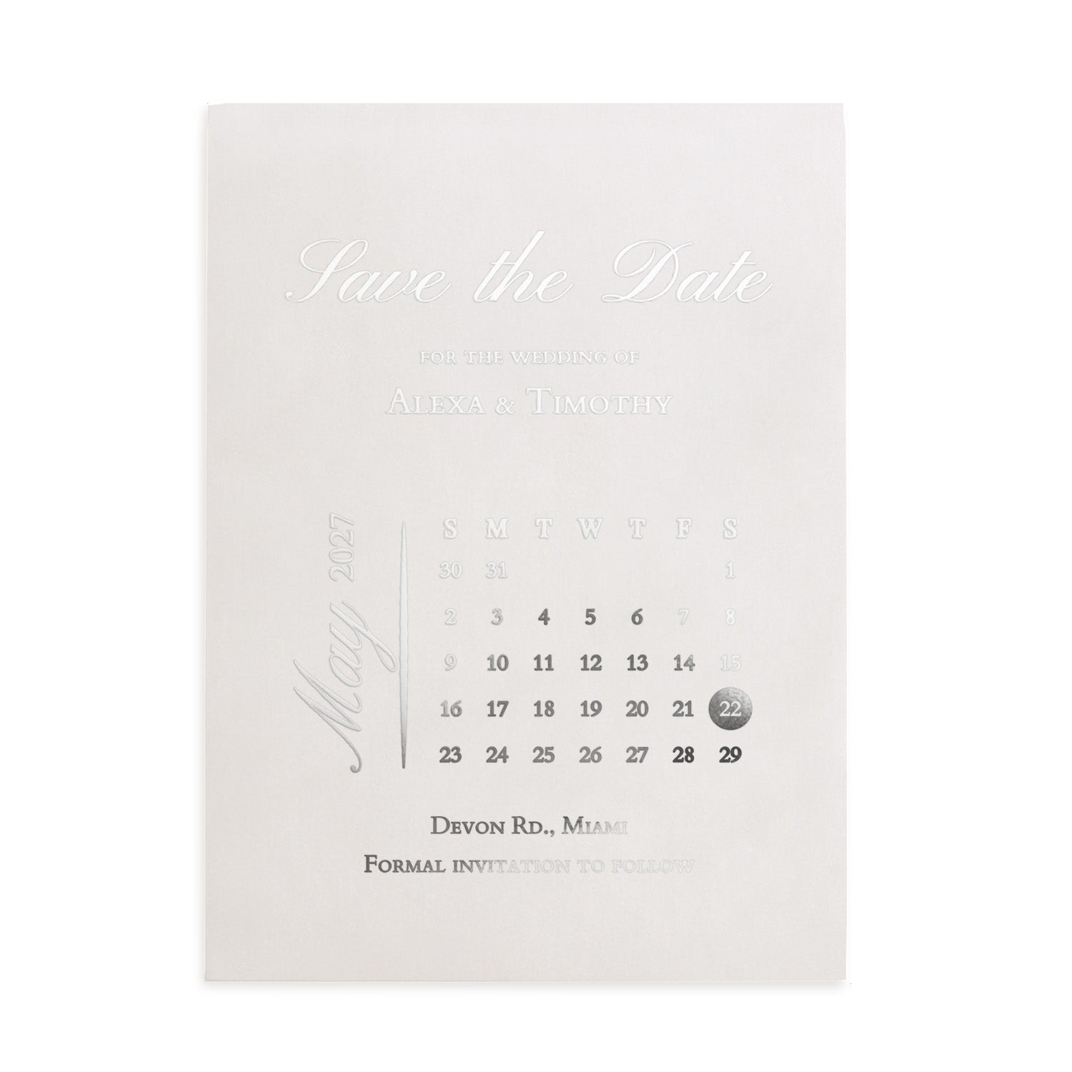 Vellum “Save the Date” wedding card with delicate white calligraphy, minimalist layout, surrounded by blooming white florals and soft sunlight – XOXOKristen