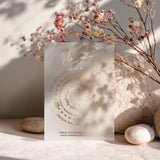 Luxury vellum wedding invitation featuring gold foil accents and intricate clock-inspired design, perfect for elegant celebrations – XOXOKristen